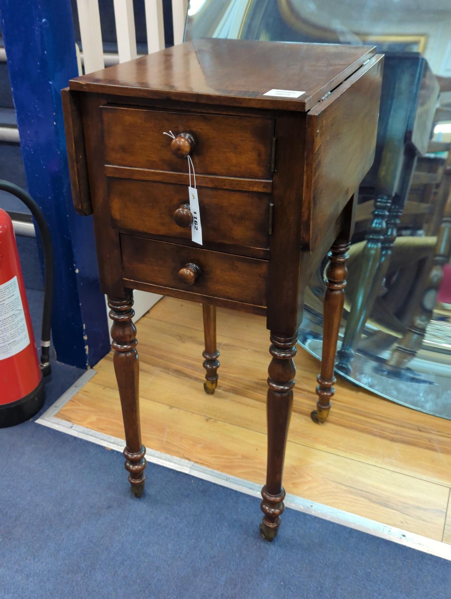 An early Victorian rosewood banded mahogany drop flap work table, width 34cm, depth 41cm, height 77cm